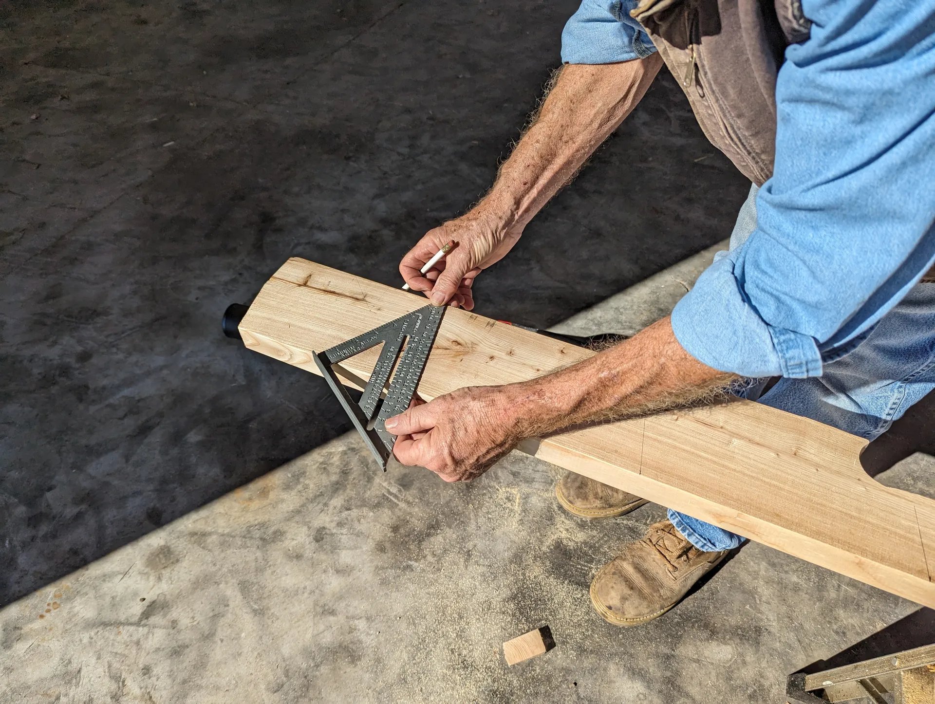 Dad using the speedy square with adept precision