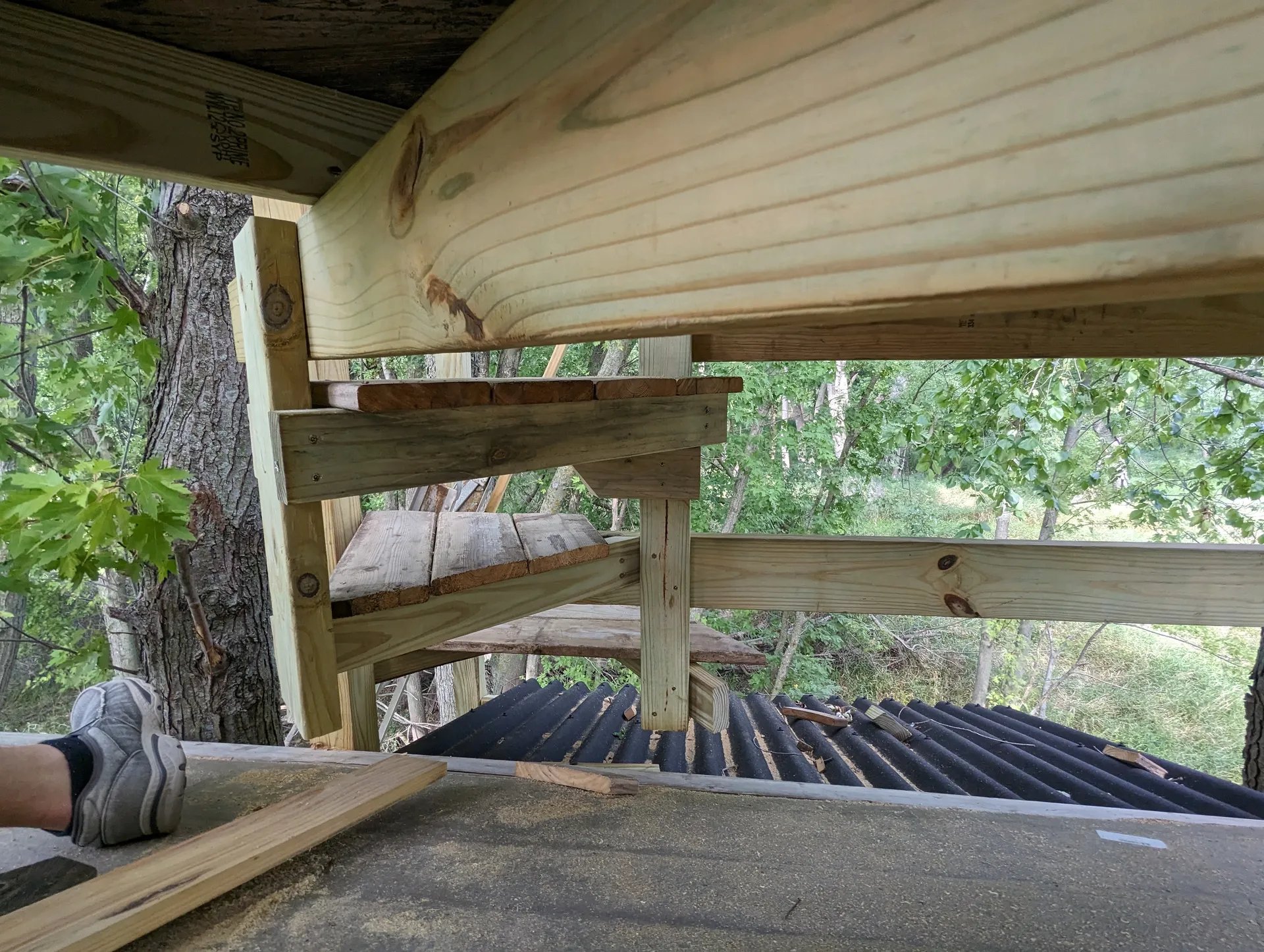 Underside of steps leading up to crow's nest platform