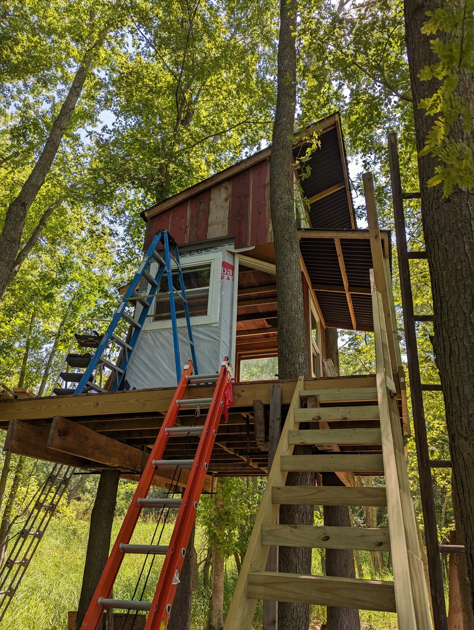 Loft siding on the west side with flashing for the small awning