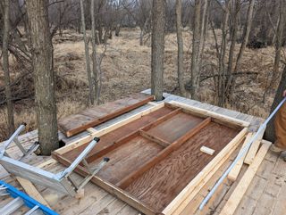 A wall section from the old cabin cut shorter with new 2x4s to fit the current floorplan