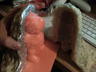 Mother mold separated, exposing the rubber mold